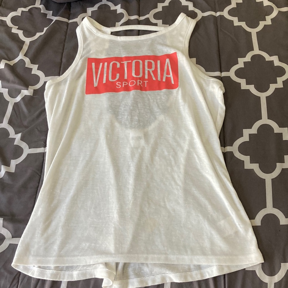 Victoria’s Secret tank top. Size Medium. White with strappy back.